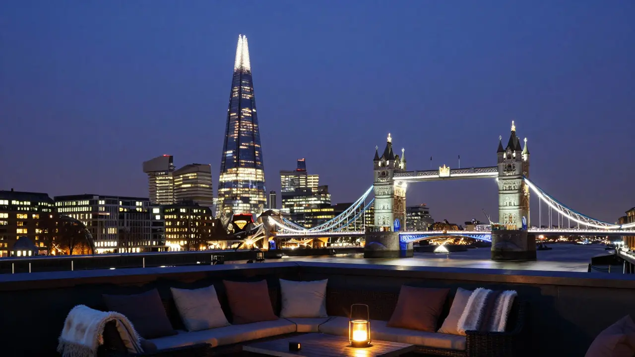 Nighttime view of London’s skyline with The Shard lit up and a cozy rooftop in the foreground.